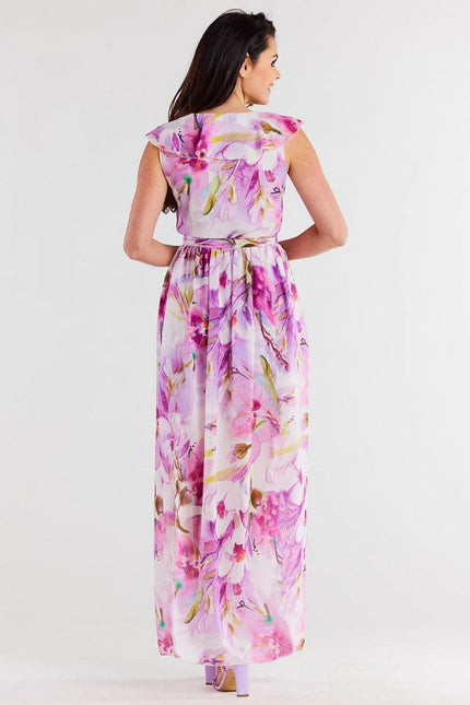 Robe longue florale rose sans manches idéale pour une soirée d'été, un mariage ou un cocktail, avec un style bohème élégant.