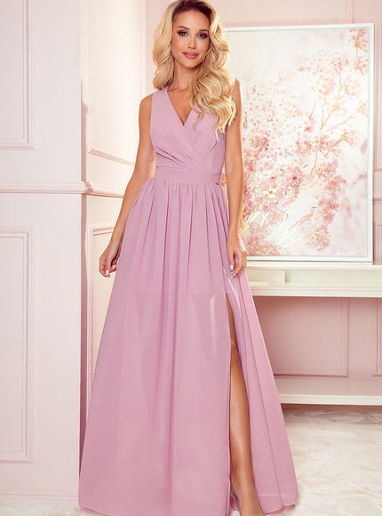 Robe soirée longue rose fendue sans manches pour gala, style chic et élégante.