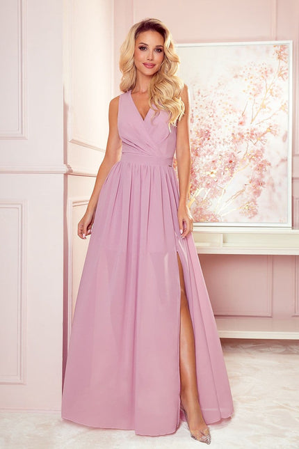 Robe soirée longue rose fendue sans manches pour gala, style chic et élégante.