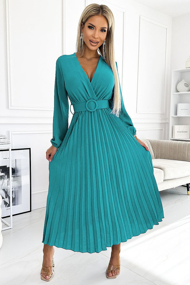 Robe soirée chic verte midi moulante avec manches longues et décolleté plongeant, idéale pour événements élégants.