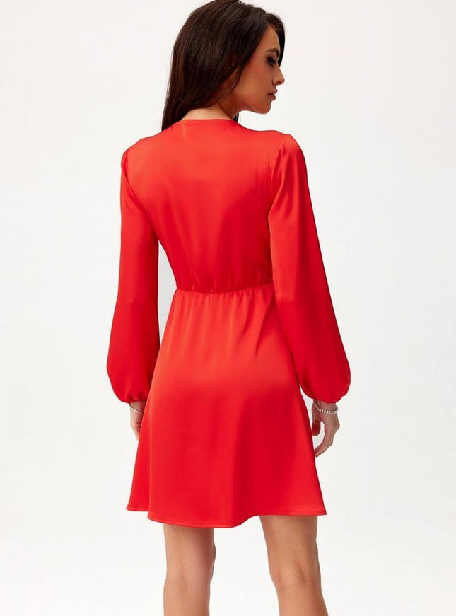 Robe rouge soirée chic midi moulante avec manches longues, idéale pour cocktail ou évènement habillé.