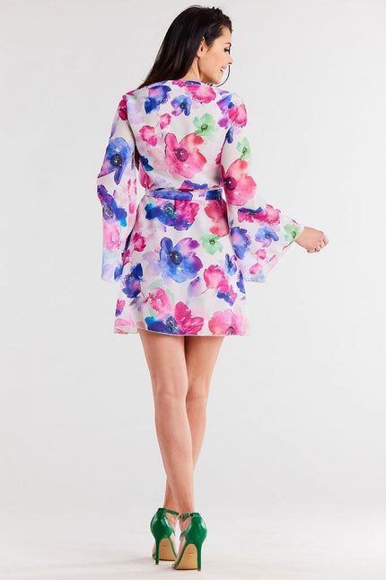 Robe fleurie courte à manches longues pour cocktail, chic en tissu léger, idéale pour évènement printanier ou soirée estivale.