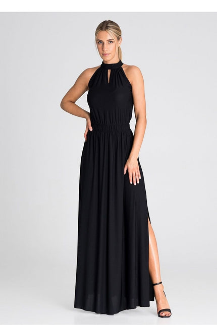 Robe soirée chic noire longue sans manches avec fente, idéale pour cocktail ou gala.