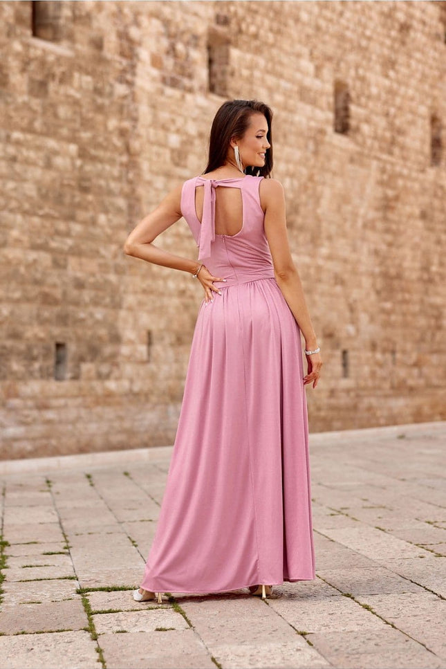 Robe soirée chic rose longue fendue, idéale pour cocktail et événements avec dos décolleté et noeud élégant.