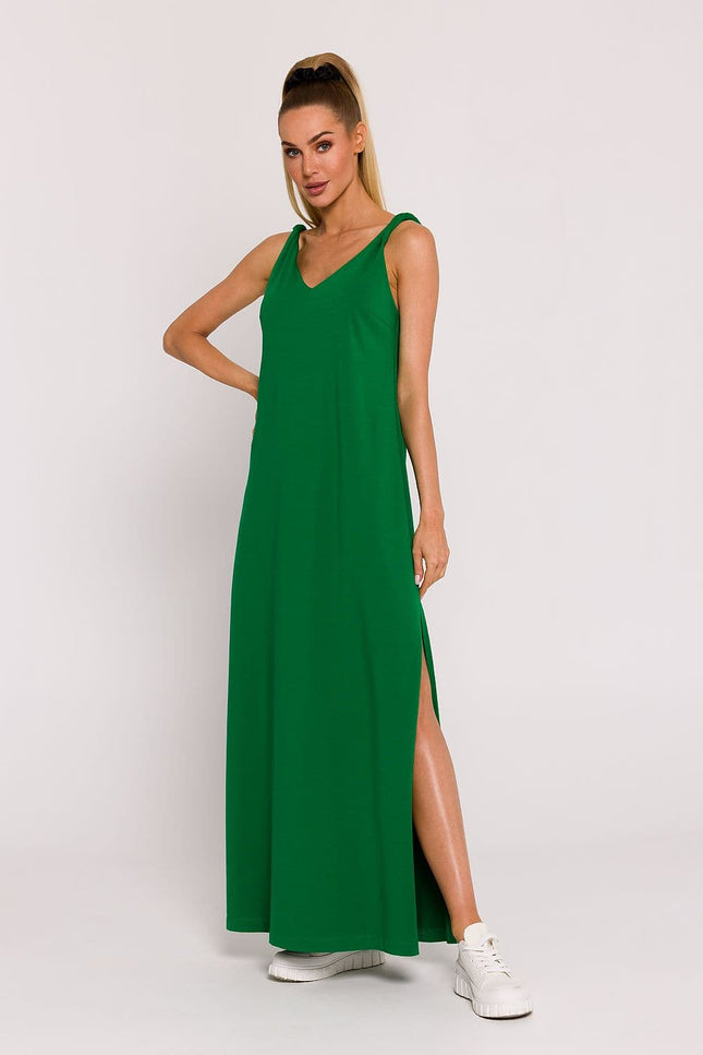 Robe verte longue simple sans manches pour soirée, col V, avec fente latérale, style élégant et fluide, idéale pour événements décontractés.