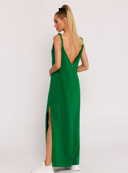 Robe verte longue sans manches pour soirée simple, avec décolleté en V et fente latérale, élégante et fluide pour femme moderne.